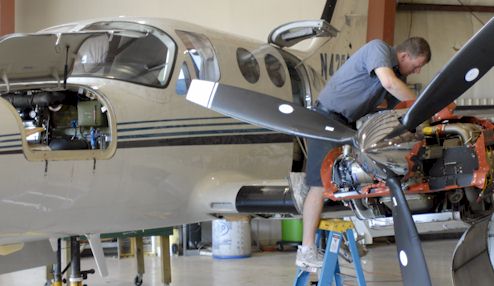 Team works on aircraft maintenance